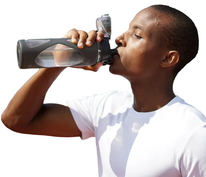 Man drinking water from a bottle